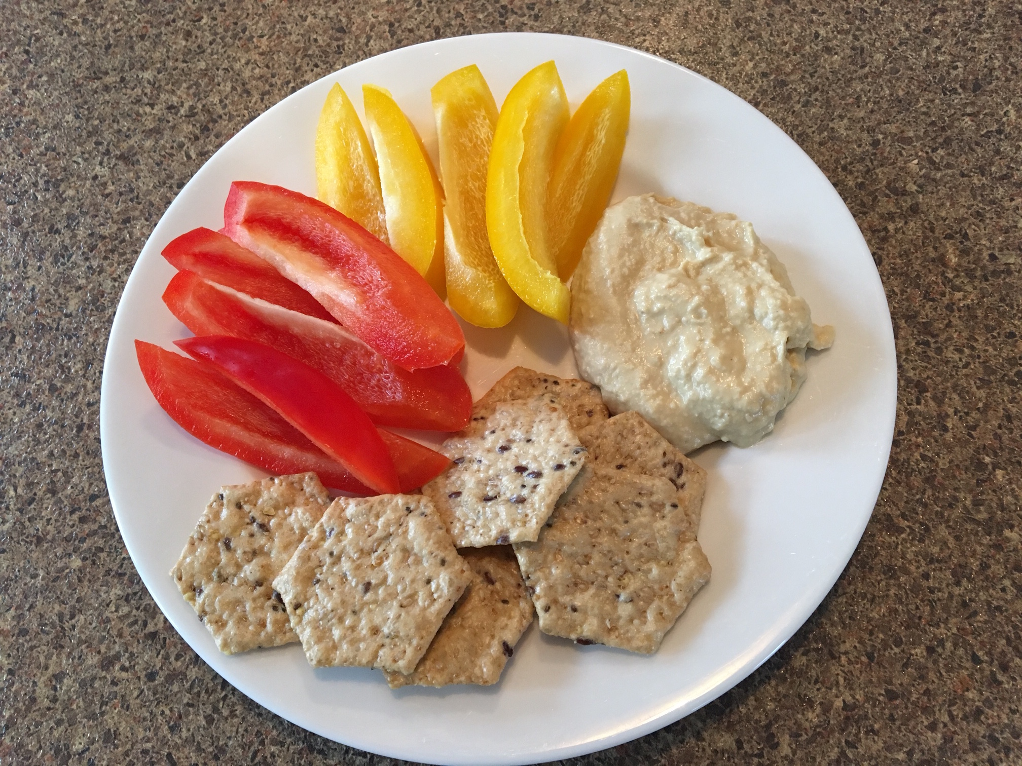 Hummus with veggies and crackers